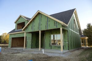 Home exterior during construction by Cimino Construction